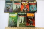 Lot of 7 Michael Moorcock ~ (6) Elric of Melnibone Books ~ (1) Swords Trilogy